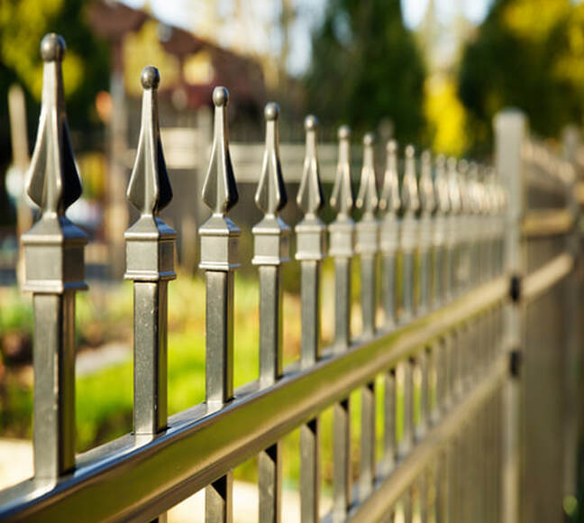 Picture of a black wrought iron fence